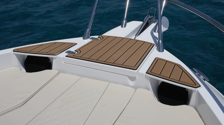 Recessed, weather protected marine grade cockpit speakers at bow and cockpit